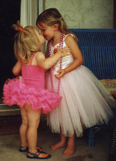 Sisters kissing